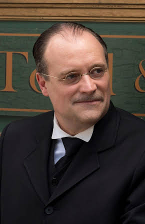 David Hewlett as Director