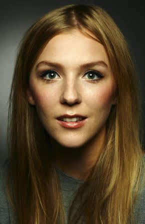 Beattie Edmondson as Laura (Young Assistant)