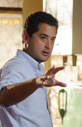 Tom Waller as Director