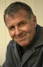 Tom Wilkinson as 
