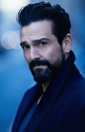Doug Rao as 