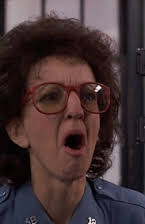 Audrie Neenan as Policewoman and Marilyn