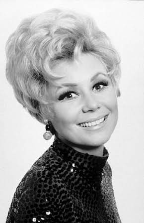 Mitzi Gaynor as 