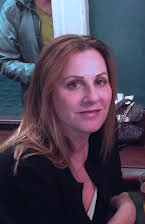 Patty Casby som Director