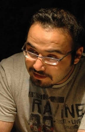 Selçuk Aydemir as Director