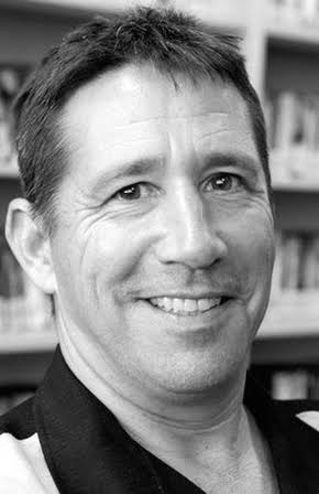 Zachary Matz as Director