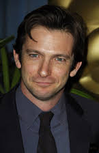 Dan Futterman como Director