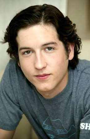 Chris Marquette as 