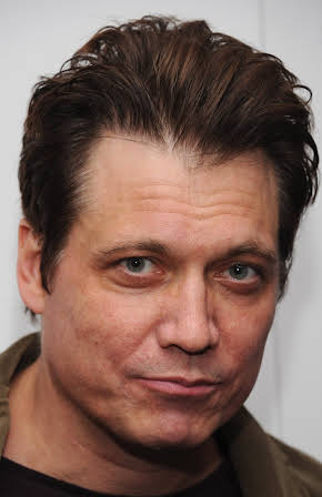 Holt McCallany as 