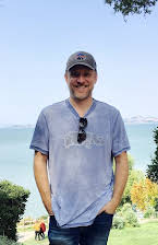 Nick Tomnay as Director