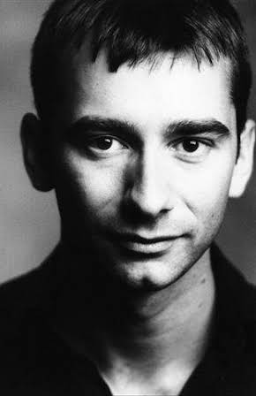 Charlie Condou as 
