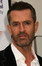 Rupert Everett como 